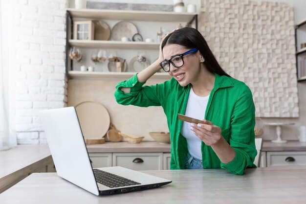 A worried-looking Portuguese consumer reviewing a BNPL bill on their laptop, highlighting the potential for financial stress and overspending.