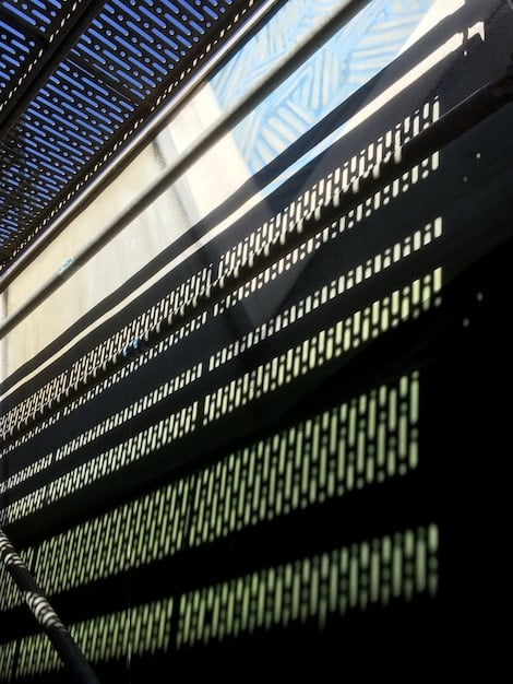 A detailed close-up of a digital interface with lines of code, security protocols, and encryption symbols interspersed with financial data charts, representing the intersection of technology and finance in cybersecurity.