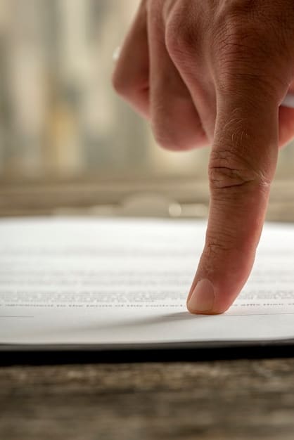 A close-up of a hand pointing at a specific line of text in a tax form, symbolizing the attention to detail needed to understand the new IRS law.