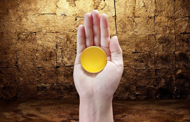 A conceptual image of a hand holding a gold coin, set against a backdrop of diverse investment options like stocks and bonds. The image highlights the strategic decision-making involved in choosing gold as part of an investment portfolio.