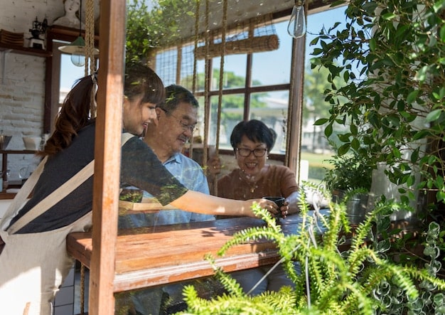 A diverse group of people working together on a rooftop garden in a city. Solar panels are visible in the background, symbolizing community engagement with sustainable initiatives and renewable energy.